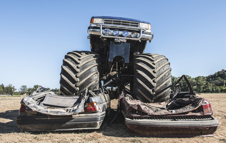 Monster Trucks Demolishing 2 Cars